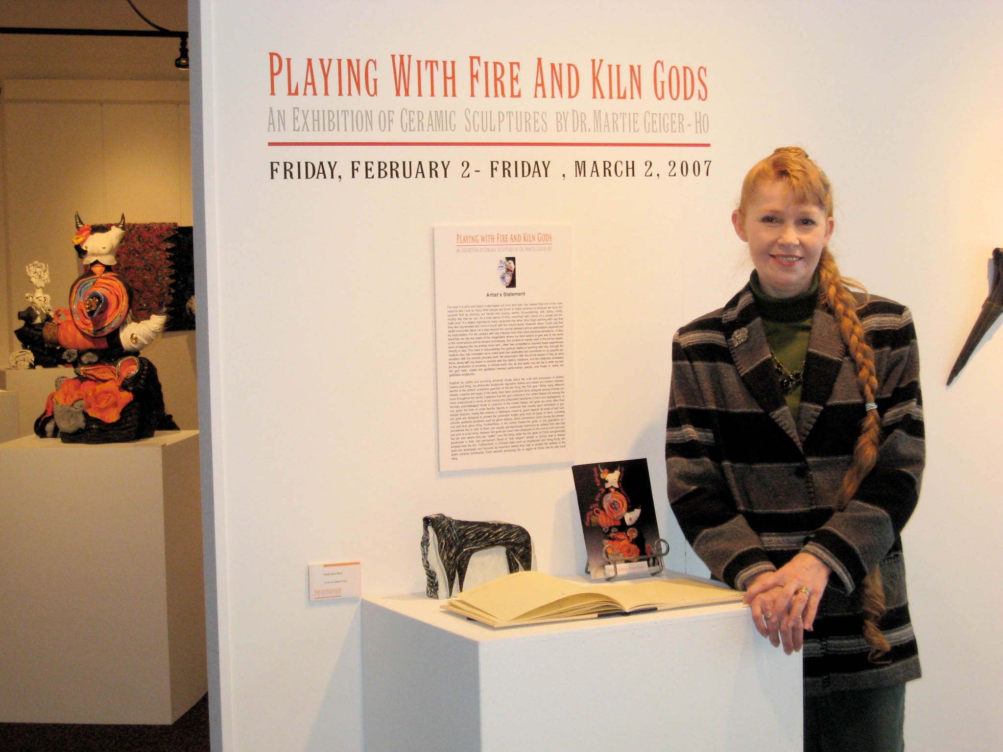 Martie Geiger-Ho at the entrance to Playing with Fire and Kiln Gods