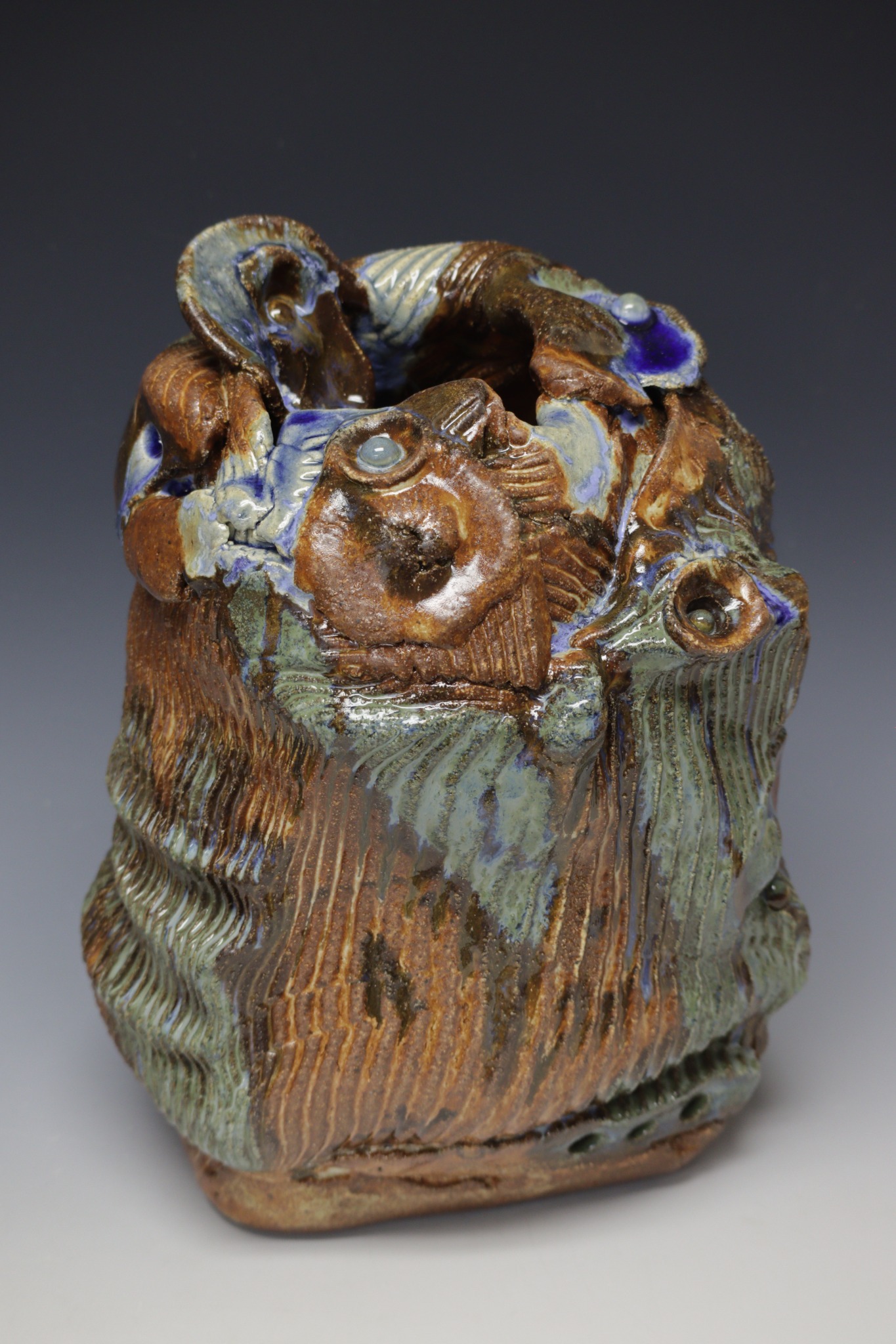 Stretched Land Pot.