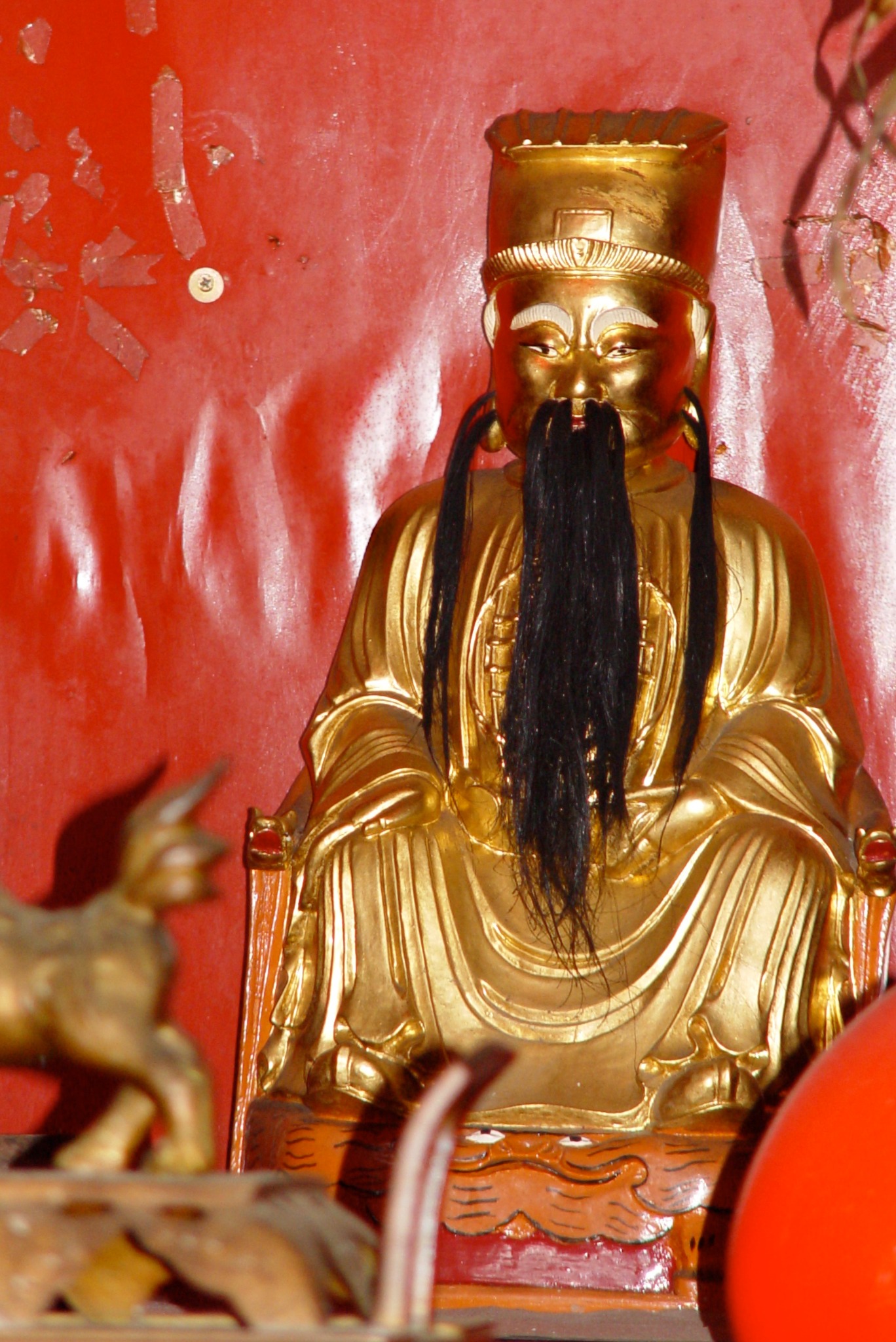 Fan Tai Sin deity figure.